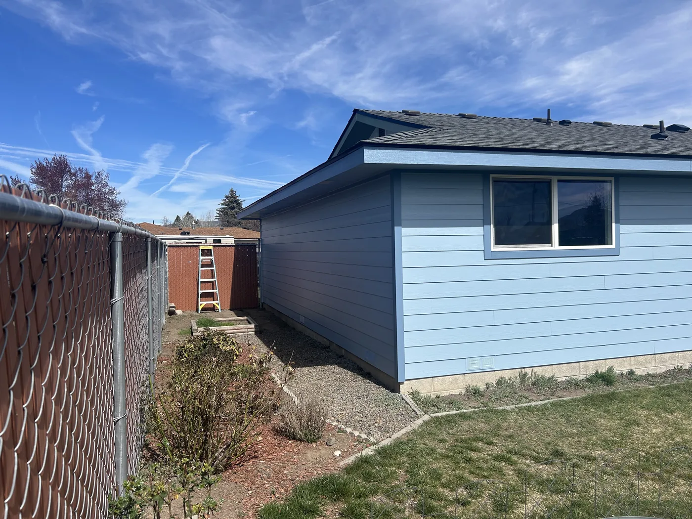 After photo showing completed siding and paint on a Linkville customer home