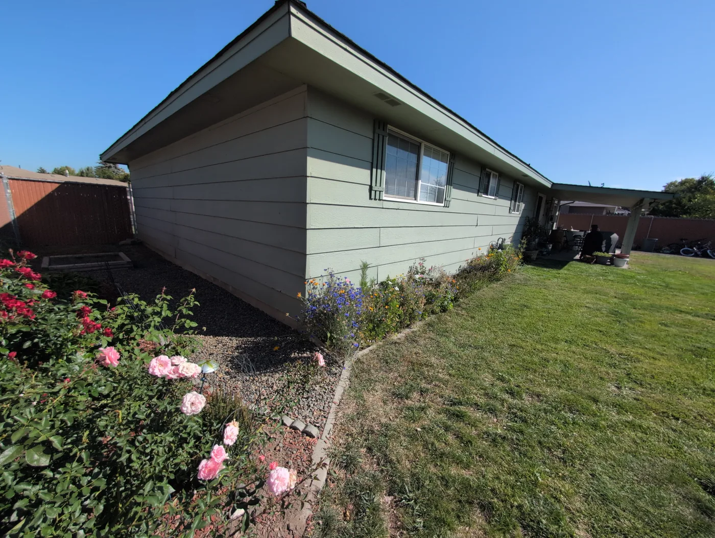 Before photo showing siding project progress on a Linkville customer home