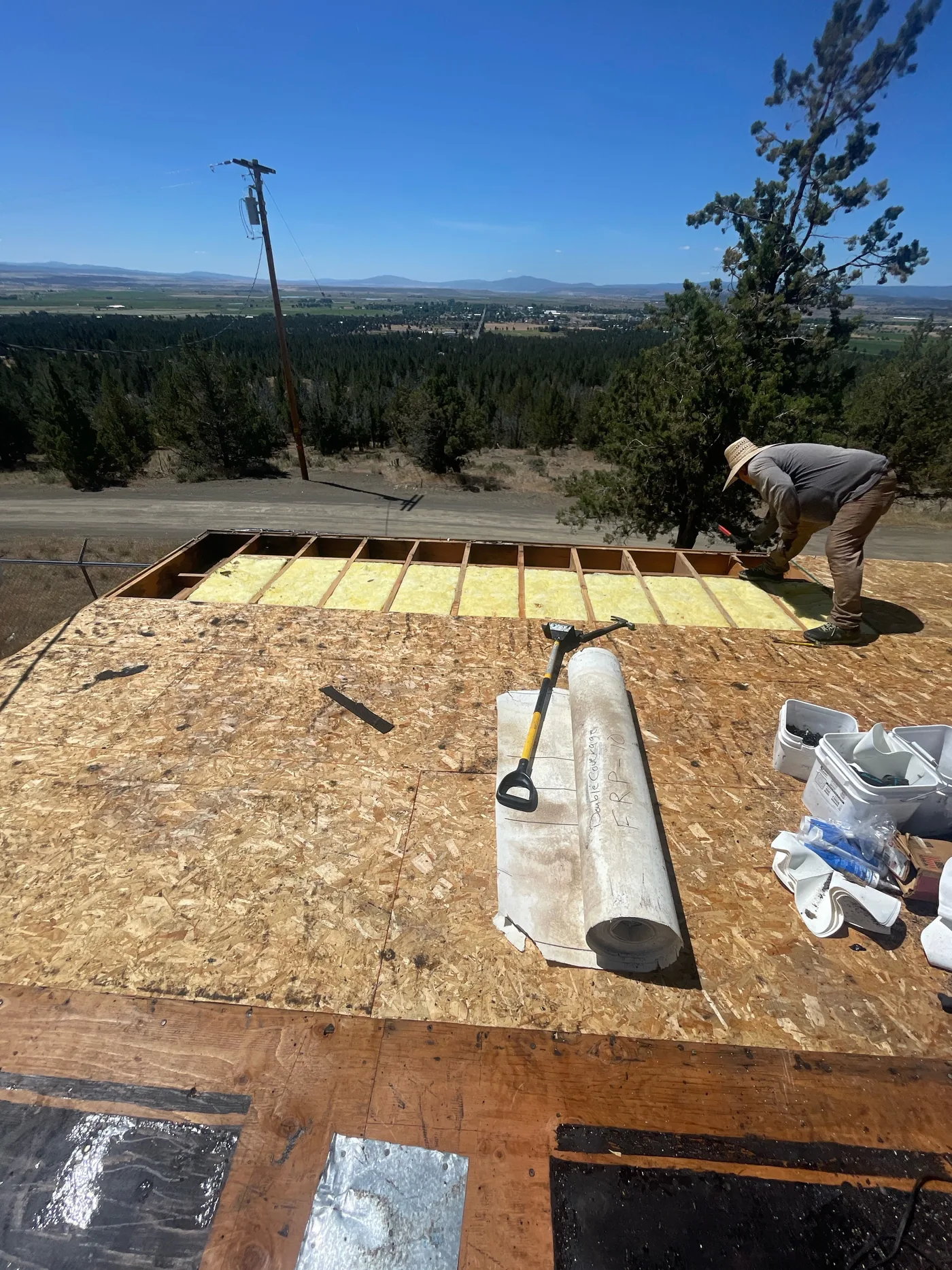 During photo of an Alturas low-slope roof project by Linkville Roofing and Siding