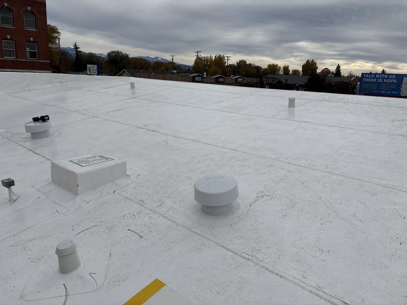 After photo of an Alturas low-slope commercial roof project by Linkville Roofing and Siding