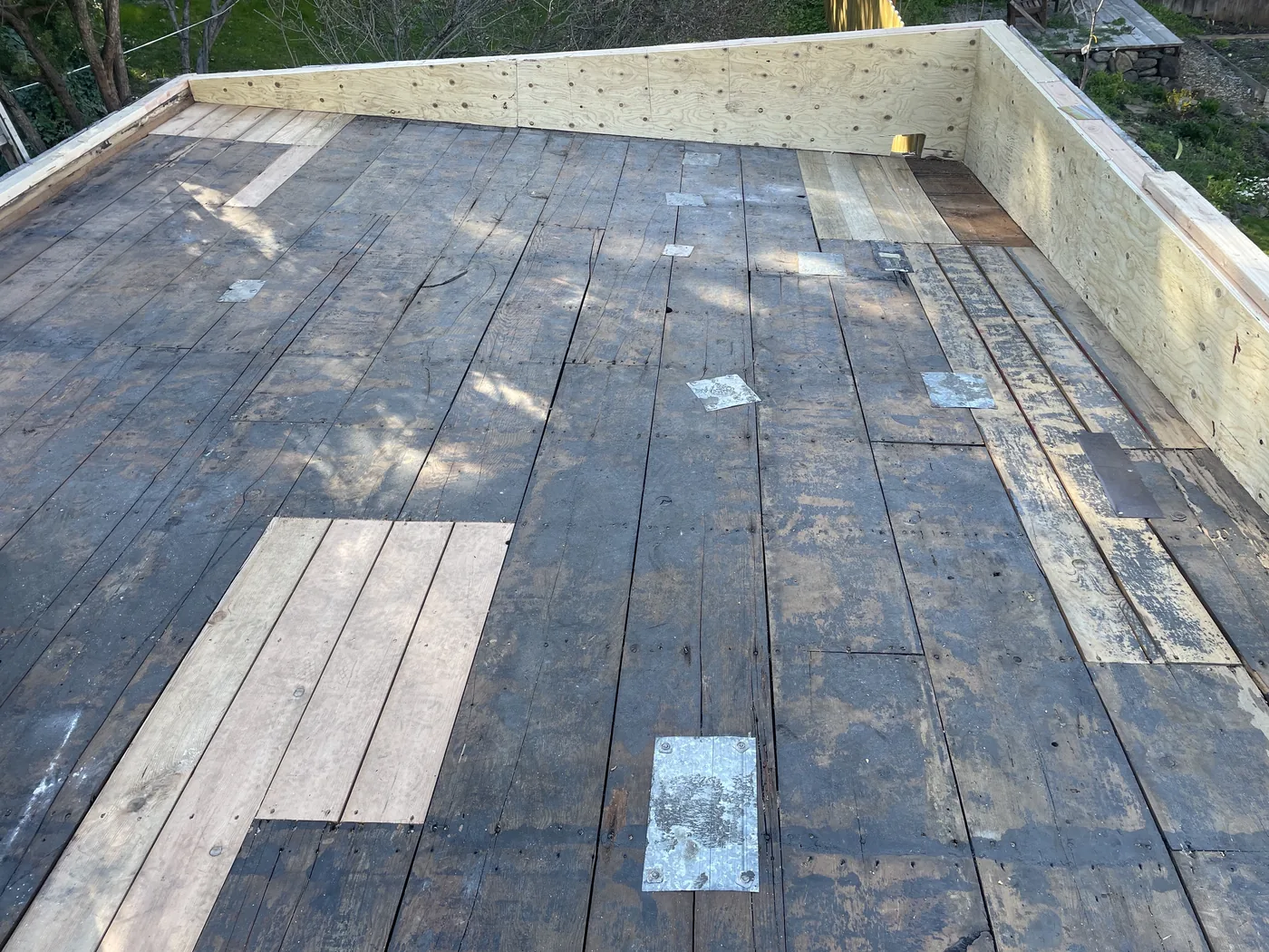 During photo of an Ashland low-slope roof project by Linkville Roofing and Siding
