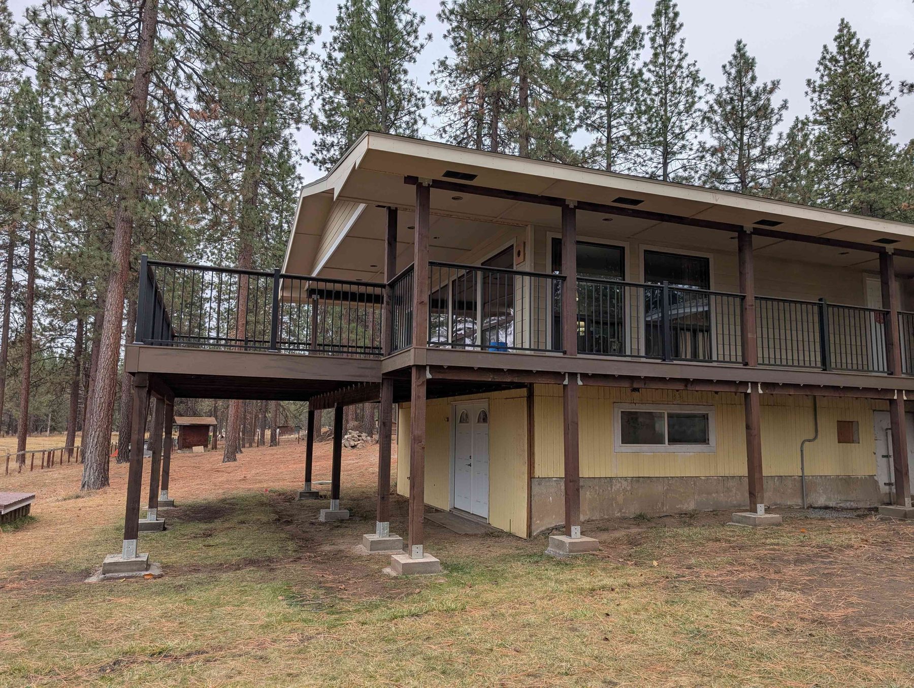 Finished exterior project showing new deck construction work