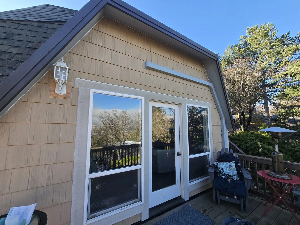 Residential siding before project