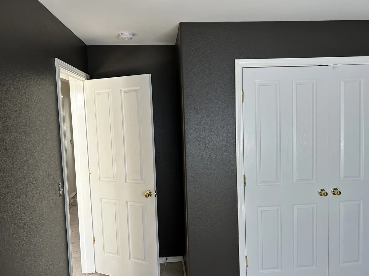 Interior room after dark accent wall painting