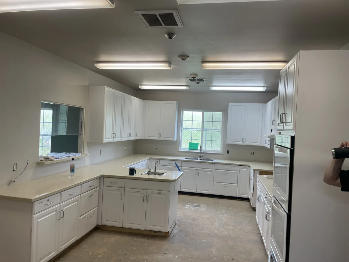 Kitchen protected during interior painting prep