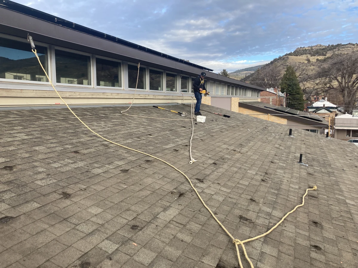 Before photo of roof before metal roofing work by Linkville Roofing and Siding