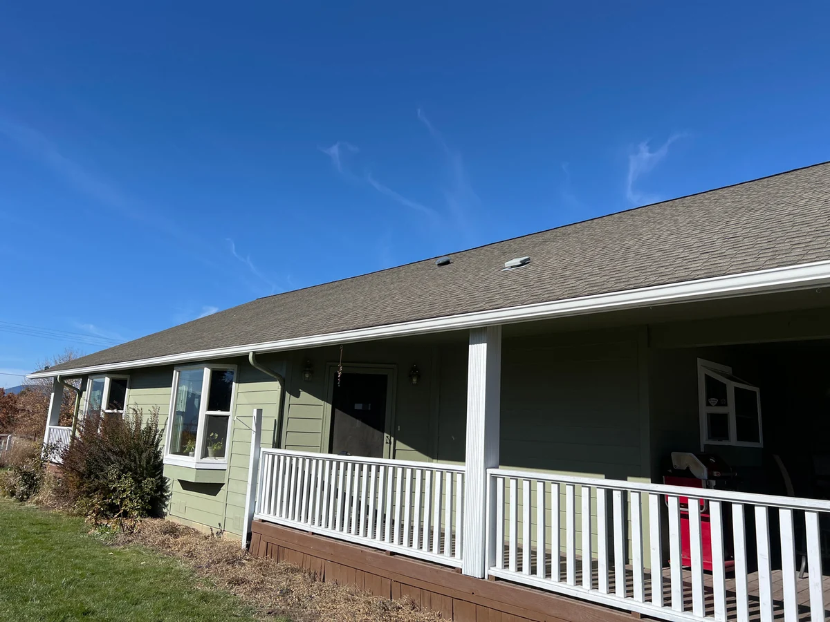 Before photo of shingle roof before metal roofing work by Linkville Roofing and Siding